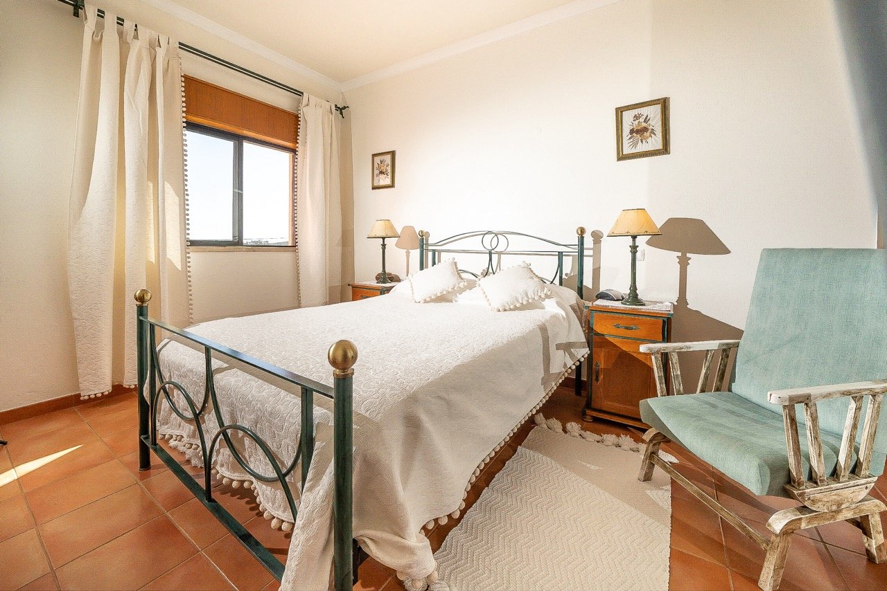Bedroom with double bed and natural light